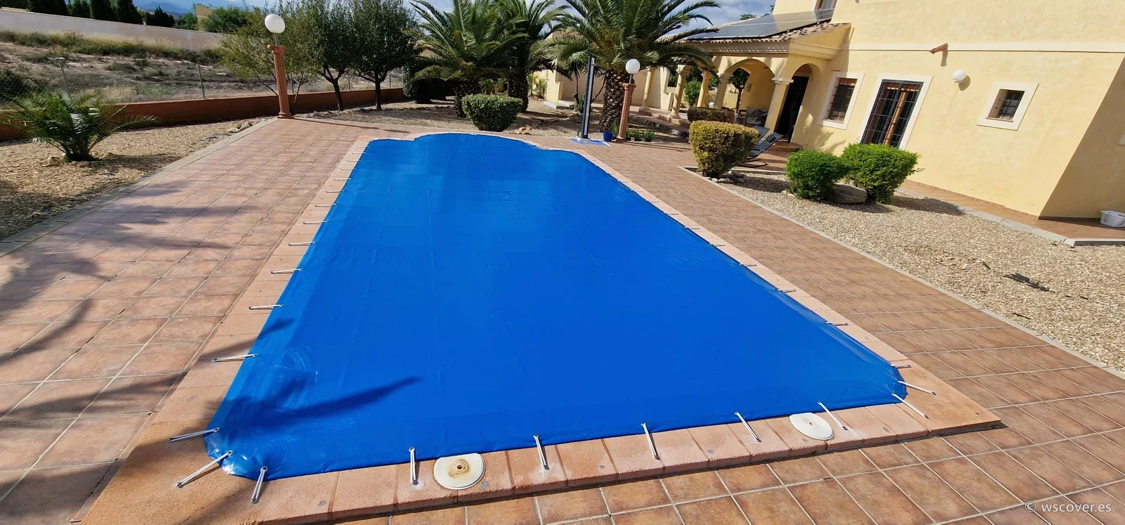 Winter PVC cover on a rectangular pool